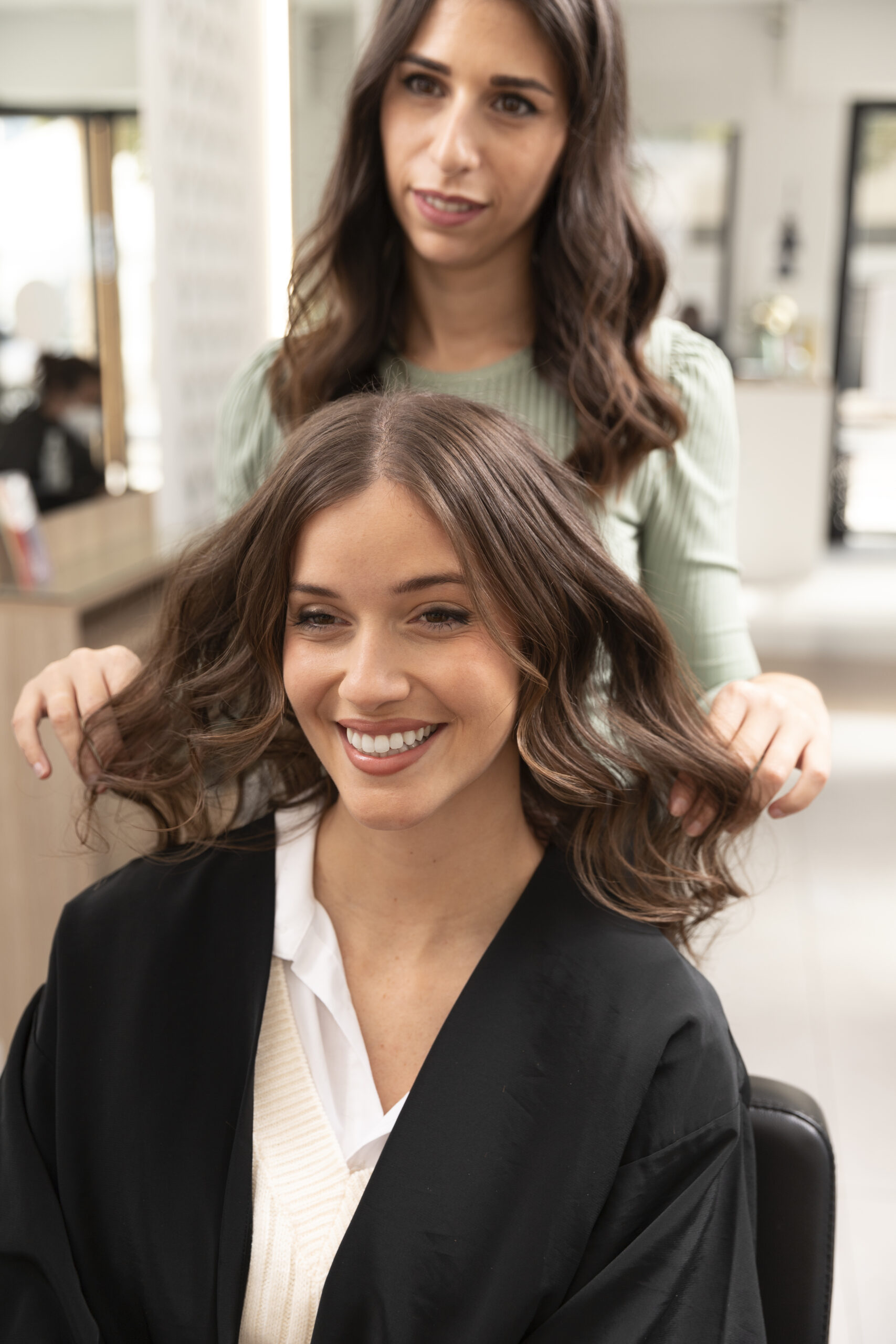 woman getting treatment hairdresser shop scaled